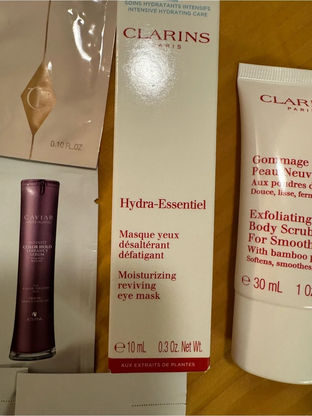 Clarins Pouch with Clarins and other product samples
